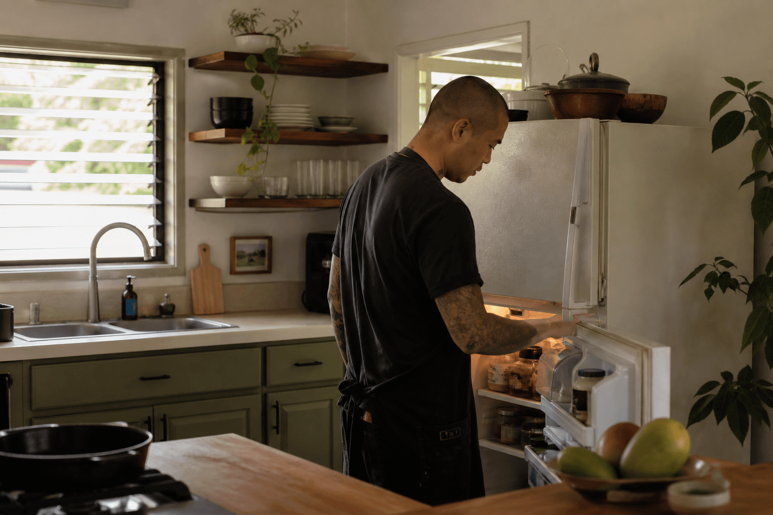 A Kīhei resident kitchen on a weekday — a used fridge, not a Wailea tourist SKU.